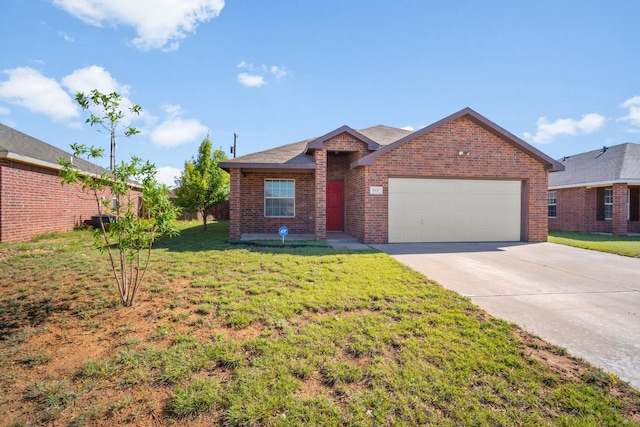 ranch-style house featuring a garage and a front yard