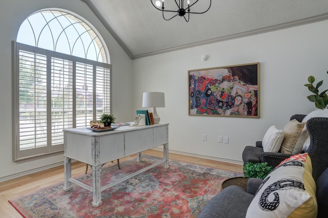 office space featuring lofted ceiling, crown molding, light hardwood / wood-style flooring, an inviting chandelier, and a textured ceiling