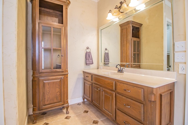 bathroom with tile patterned flooring and vanity