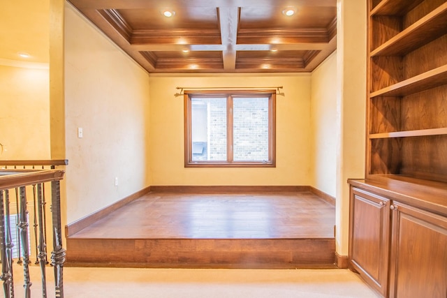 unfurnished room with coffered ceiling, recessed lighting, and ornamental molding