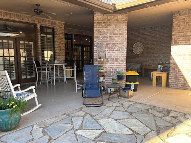 view of patio with french doors and ceiling fan