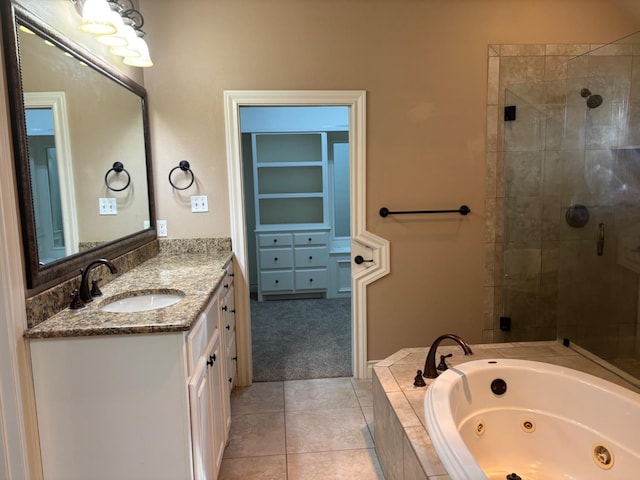 bathroom with vanity, plus walk in shower, and tile patterned flooring