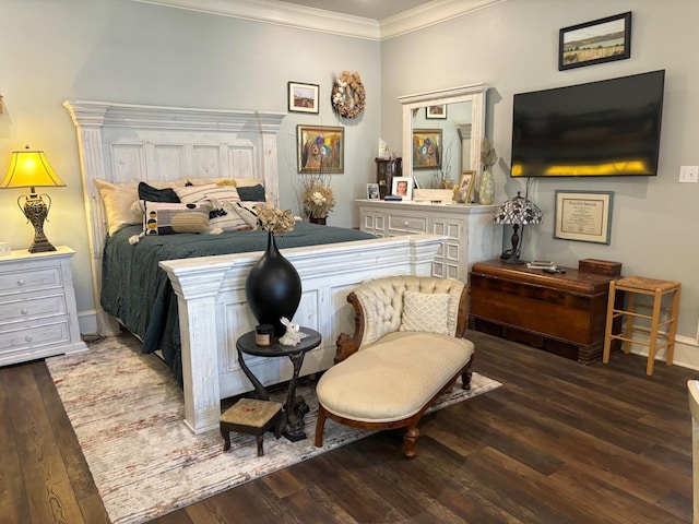 bedroom with crown molding and dark hardwood / wood-style floors