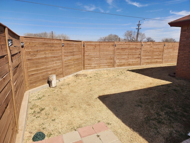 view of yard featuring a fenced backyard