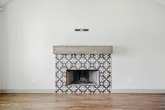 10330 Ave X Ave, Lubbock, TX 79423 - detailed view of wood finished floors and a fireplace