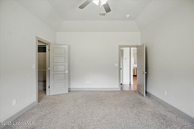 10330 Ave X Ave, Lubbock, TX 79423 - unfurnished bedroom with carpet floors, ceiling fan, and a walk in closet