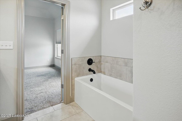 10330 Ave X Ave, Lubbock, TX 79423 - bathroom with a bath and tile patterned floors