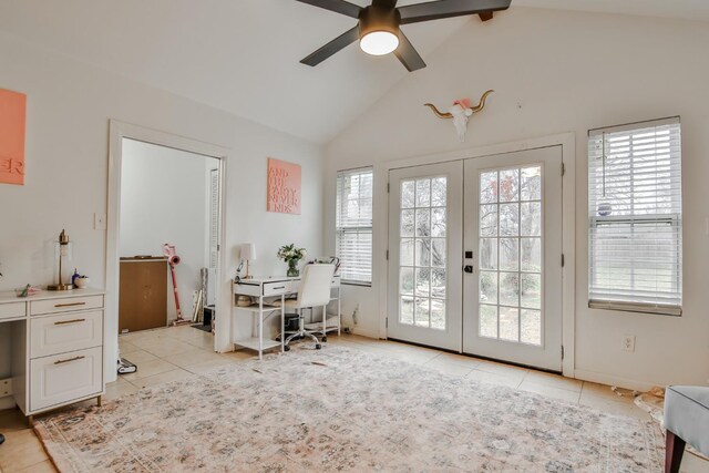 interior space featuring french doors, ceiling fan, a wealth of natural light, and vaulted ceiling with beams