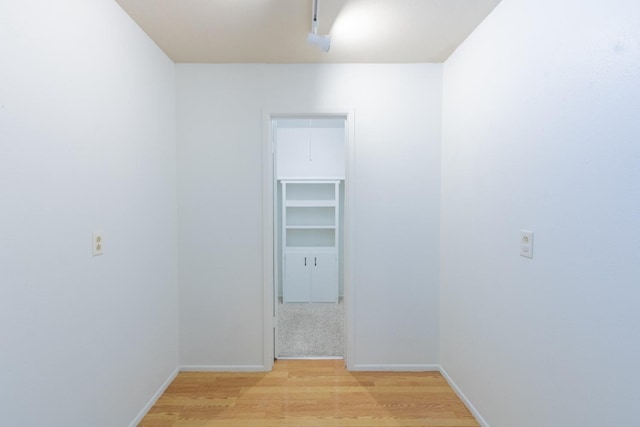 unfurnished room with light hardwood / wood-style floors