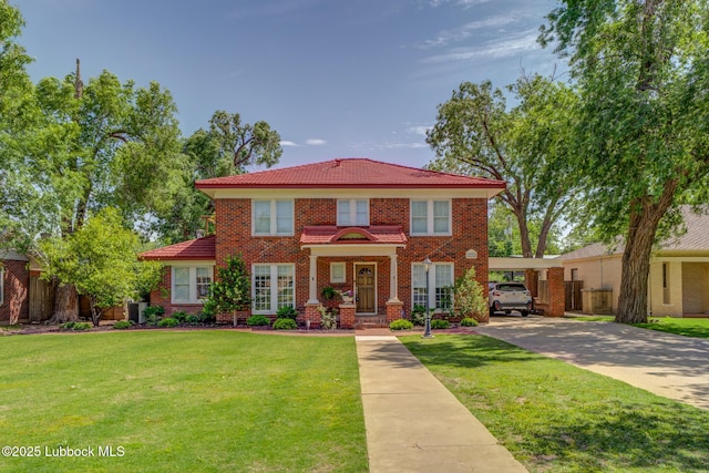 3003 19th St, Lubbock, TX 79410 - view of front of home featuring driveway, a carport, and brick siding