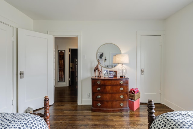 3003 19th St, Lubbock, TX 79410 - bedroom with wood finished floors and baseboards