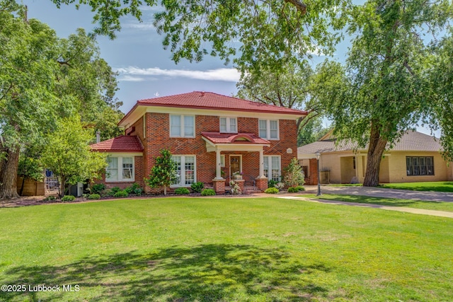 3003 19th St, Lubbock, TX 79410 - view of front facade featuring a front lawn and a tiled roof