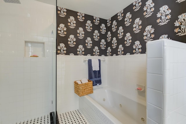 3003 19th St, Lubbock, TX 79410 - bathroom with wallpapered walls, a jetted tub, and a tile shower