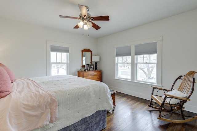 3003 19th St, Lubbock, TX 79410 - bedroom featuring dark wood-type flooring and ceiling fan