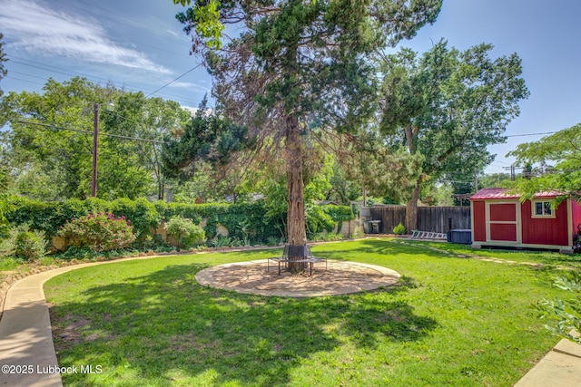 3003 19th St, Lubbock, TX 79410 - view of yard with a storage shed and a patio area
