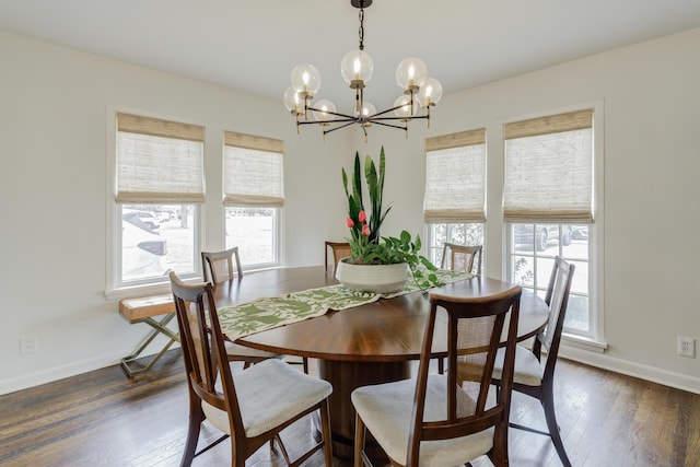 3003 19th St, Lubbock, TX 79410 - dining area with healthy amount of natural light, a chandelier, and dark wood-style flooring