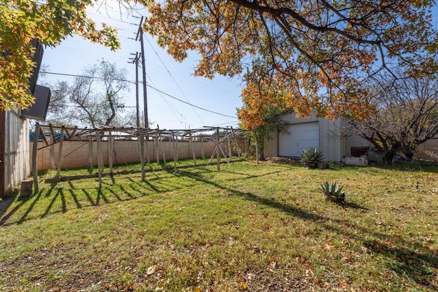 view of yard featuring a garage