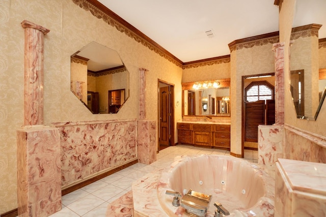 bathroom with ornamental molding, a tub to relax in, tile patterned flooring, and vanity