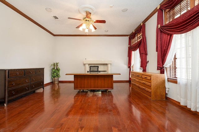 office area featuring ornamental molding, dark wood-type flooring, and ceiling fan