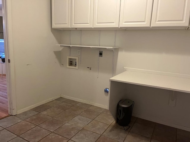 washroom with cabinets, electric dryer hookup, washer hookup, and tile patterned floors