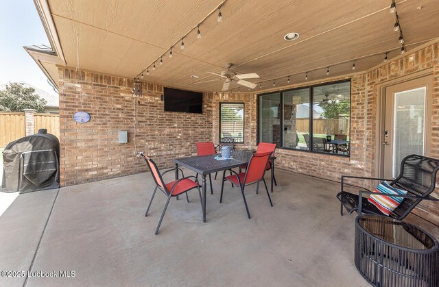5004 County Rd 1430, Lubbock, TX 79407 - view of patio / terrace featuring outdoor dining space and a ceiling fan