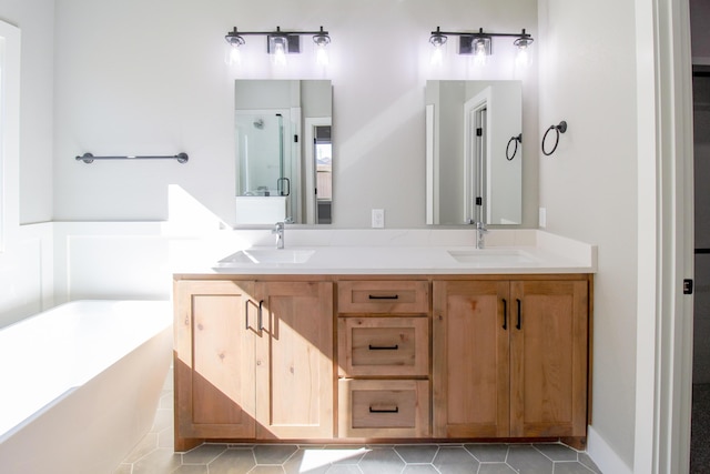 bathroom featuring vanity and plus walk in shower