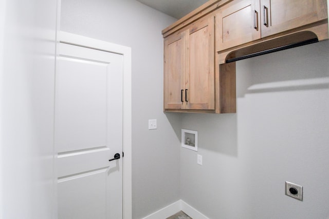 laundry room featuring washer hookup, cabinets, and hookup for an electric dryer