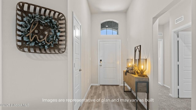 2337 149th St, Lubbock, TX 79423 - foyer featuring baseboards and wood finished floors