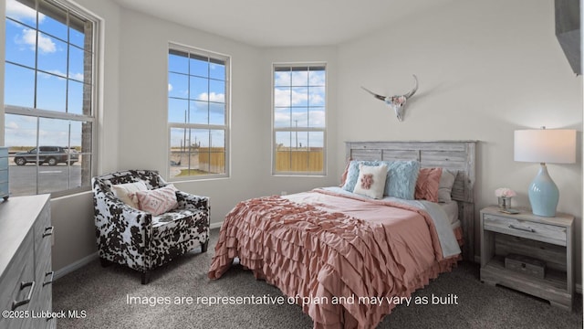 2337 149th St, Lubbock, TX 79423 - carpeted bedroom featuring baseboards