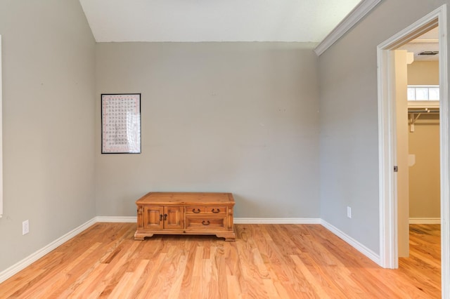 empty room with light wood-type flooring