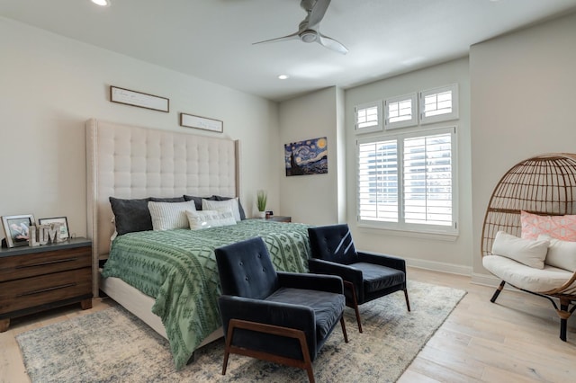 bedroom featuring ceiling fan and light wood-type flooring