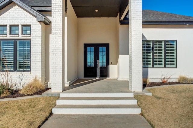 doorway to property featuring french doors