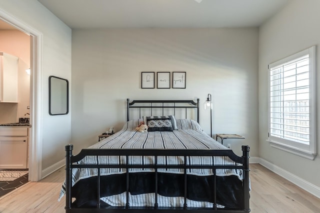 bedroom featuring light hardwood / wood-style flooring