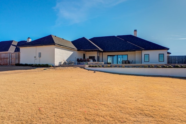 back of house featuring a patio