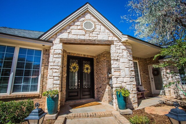 doorway to property featuring french doors