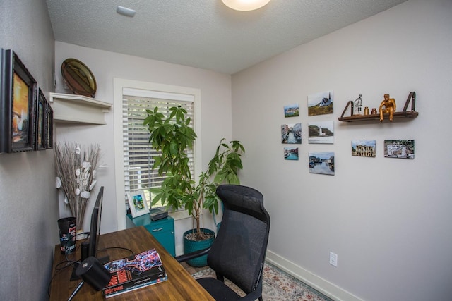 office featuring a textured ceiling