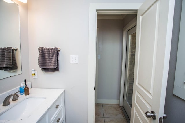 bathroom featuring tile patterned floors and vanity