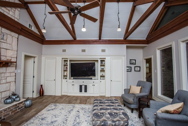 living room featuring hardwood / wood-style floors, beam ceiling, high vaulted ceiling, and ceiling fan