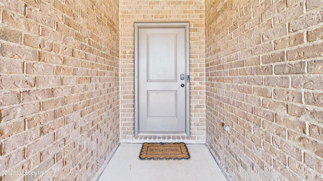 1105 Cajun St, Odessa, TX 79765 - doorway to property with brick siding
