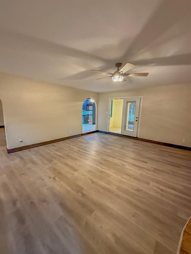 interior space with ceiling fan and light wood-type flooring