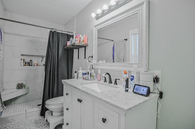 bathroom featuring vanity, a shower with curtain, and toilet