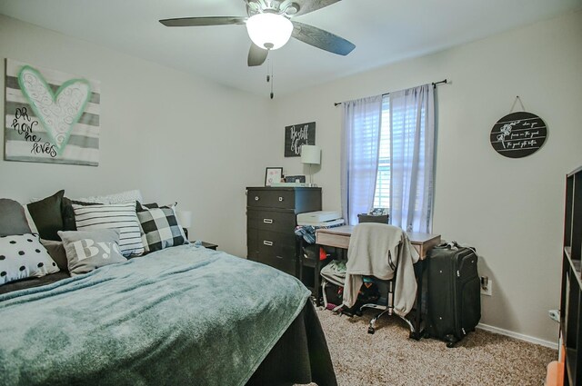 carpeted bedroom with ceiling fan