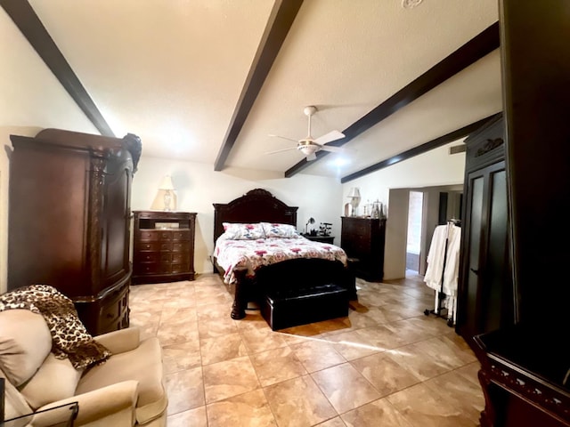 tiled bedroom with lofted ceiling with beams and ceiling fan