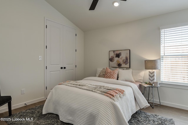 3617 127th St, Lubbock, TX 79423 - bedroom featuring vaulted ceiling, wood finished floors, a closet, and ceiling fan