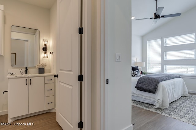 3617 127th St, Lubbock, TX 79423 - bedroom with light wood finished floors and vaulted ceiling