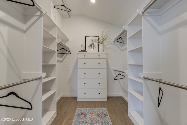 3617 127th St, Lubbock, TX 79423 - spacious closet with wood finished floors and vaulted ceiling