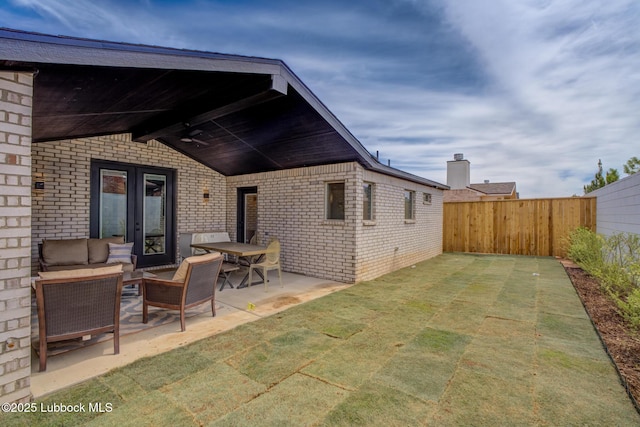 3617 127th St, Lubbock, TX 79423 - fenced backyard featuring a patio, french doors, and outdoor lounge area
