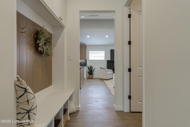3617 127th St, Lubbock, TX 79423 - mudroom with light wood finished floors and recessed lighting