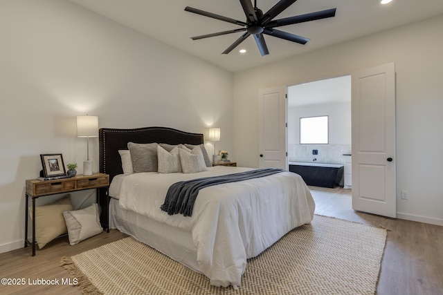 3617 127th St, Lubbock, TX 79423 - bedroom featuring recessed lighting, light wood-style flooring, ensuite bath, and a ceiling fan