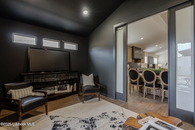 3617 127th St, Lubbock, TX 79423 - living area featuring vaulted ceiling, wood finished floors, and recessed lighting